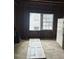 Interior view with exposed framing near window showcasing the need to revitalize the structure and create a new vision at 240 Mathewson Sw, Atlanta, GA 30314