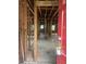 Interior view with exposed framing, a red door and raw design that offers an opportunity for complete customization at 240 Mathewson Sw, Atlanta, GA 30314