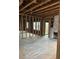 Unfinished living room featuring a fireplace and exposed beams, awaiting your personal touch and design at 240 Mathewson Sw, Atlanta, GA 30314