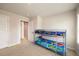 bedroom showcasing bunk bed, carpet, and bright window with plenty of natural light at 446 Noblewood Dr, Mcdonough, GA 30252