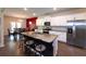 Modern kitchen with stainless steel appliances, granite countertops, and breakfast bar seating at 446 Noblewood Dr, Mcdonough, GA 30252