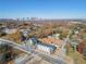 Stunning aerial view of new townhomes with modern architecture and a beautiful skyline backdrop on a sunny day at 103 Mission Se Way # 103, Atlanta, GA 30315