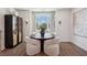Well-decorated dining room with a round table, comfortable chairs, and elegant decor at 103 Mission Se Way # 103, Atlanta, GA 30315