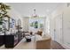 Cozy living room with natural light, neutral decor and hardwood floors at 103 Mission Se Way # 103, Atlanta, GA 30315