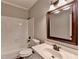 Full bathroom with tub, shower, mirror, and sink at 2049 Mclain Nw Rd, Acworth, GA 30101