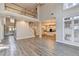 Large open living room with staircase and views to the kitchen area at 2049 Mclain Nw Rd, Acworth, GA 30101