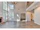 Spacious living room boasts cathedral ceilings and a cozy brick fireplace at 2049 Mclain Nw Rd, Acworth, GA 30101