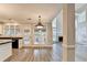 Spacious living room with gray floors, open floor plan and a fireplace makes for comfortable living at 2049 Mclain Nw Rd, Acworth, GA 30101