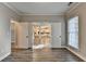 Bright office with hardwood floors and double doors that lead into the kitchen at 2049 Mclain Nw Rd, Acworth, GA 30101