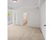 Bedroom featuring neutral carpeting and a doorway to the bathroom at 2438 Whites Rdg, Decatur, GA 30034