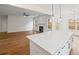Open concept kitchen featuring white cabinets, stainless steel appliances, and an island at 2438 Whites Rdg, Decatur, GA 30034