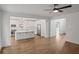Bright living room featuring hardwood floors, an open-concept view of the kitchen at 2438 Whites Rdg, Decatur, GA 30034