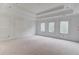 Spacious bedroom under construction featuring large windows and decorative ceilings and walls at 3203 Bold Springs Rd, Dacula, GA 30011