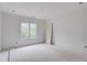 This bedroom has large windows for lots of natural light at 3203 Bold Springs Rd, Dacula, GA 30011