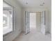 Unfinished entry way with double doors at 3203 Bold Springs Rd, Dacula, GA 30011