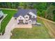 New construction two-story home featuring a manicured lawn and neutral brick at 3203 Bold Springs Rd, Dacula, GA 30011