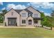 Beautiful two-story home with modern brickwork, a well-manicured lawn, and professional landscaping at 3203 Bold Springs Rd, Dacula, GA 30011