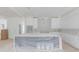 Spacious kitchen featuring a large center island with ample counter space and custom cabinetry at 3203 Bold Springs Rd, Dacula, GA 30011