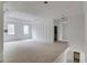 Bright, spacious room with decorative ceilings, walls, and large windows, still under construction at 3203 Bold Springs Rd, Dacula, GA 30011