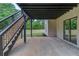 Patio with dark support beams, stairs, and a view of the backyard and side of the home at 3203 Bold Springs Rd, Dacula, GA 30011