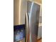Side-by-side stainless steel refrigerator with a water and ice dispenser at 4075 Sw Fairburn Sw Ave, Atlanta, GA 30331