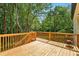 Wooden deck overlooking a private backyard at 77 Township Drive, Hiram, GA 30141
