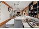 Spacious finished basement features a large seating area, decorative mural, and ceiling fan for comfort at 2030 Spring End Ct, Lawrenceville, GA 30044