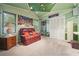 Bonus room with unique geometric ceiling and a comfortable seating area at 2030 Spring End Ct, Lawrenceville, GA 30044