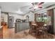 Kitchen and dining area with stainless steel appliances and white cabinets at 2030 Spring End Ct, Lawrenceville, GA 30044