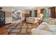 Cozy living room showcasing wood floors and views to the stairway at 2030 Spring End Ct, Lawrenceville, GA 30044