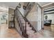 Upstairs stairway with tile flooring, carpeted stairs, and neutral walls at 2030 Spring End Ct, Lawrenceville, GA 30044