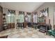 Bright sun room with multiple windows and checkered tile flooring at 2030 Spring End Ct, Lawrenceville, GA 30044