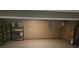 Spacious unfinished basement with shelves, concrete floor, and painted walls, great for storage or finishing at 2811 Country Farms Ct, Snellville, GA 30039