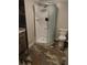 Bathroom with a modern shower, corner vanity and tile floor at 2811 Country Farms Ct, Snellville, GA 30039