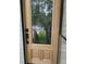 A beautiful wooden front door with decorative glass at 2811 Country Farms Ct, Snellville, GA 30039