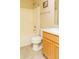 Bathroom with a standard tub and toilet, and wood vanity at 68 Paradise Pointe, Douglasville, GA 30134