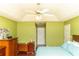 Spacious bedroom with ceiling fan, hardwood floors, and view into hallway at 68 Paradise Pointe, Douglasville, GA 30134