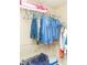 Walk-in closet featuring shelving and hanging storage for clothing at 68 Paradise Pointe, Douglasville, GA 30134