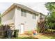 Exterior of the home featuring siding, a walkout basement, and a wooden deck at 68 Paradise Pointe, Douglasville, GA 30134