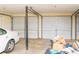 Three car garage, with car parked in the garage at 68 Paradise Pointe, Douglasville, GA 30134