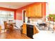 Bright kitchen featuring stainless appliances, wood floors, and plenty of counter space at 68 Paradise Pointe, Douglasville, GA 30134