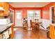 Bright kitchen featuring wood floors, updated appliances, and plenty of cabinet space at 68 Paradise Pointe, Douglasville, GA 30134