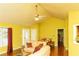 Bright living room with vaulted ceilings, a ceiling fan, and hardwood floors at 68 Paradise Pointe, Douglasville, GA 30134