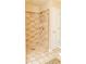 Tile shower with updated shower head and built-in shelving unit at 68 Paradise Pointe, Douglasville, GA 30134