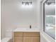 Cozy bathroom with a stylish vanity, marble countertop, and modern fixtures at 3205 Bold Springs Rd, Dacula, GA 30019