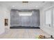 Modern dining room with a crystal chandelier, elegant trim, and hardwood floors, ready for personalization at 3205 Bold Springs Rd, Dacula, GA 30019