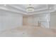 Open living area featuring custom paneling, recessed lighting, and stairs to an upper level at 3205 Bold Springs Rd, Dacula, GA 30019