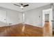 Bedroom with hardwood floors, a ceiling fan, two closets, and views to other rooms at 346 Carpenter Dr # 77, Sandy Springs, GA 30328
