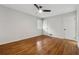 Bedroom with hardwood floors, a ceiling fan, and a window at 346 Carpenter Dr # 77, Sandy Springs, GA 30328