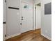 Welcoming entryway with hardwood floors, coat hooks, and neutral wall paint at 346 Carpenter Dr # 77, Sandy Springs, GA 30328